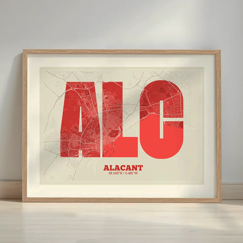 Framed Alacant in Super Bold design, a typographic poster where the city map is overlaid with extra-thick lettering for a modern, high-impact look designed in red and an off-white background with a white margin border in a warm lit minimalist setting