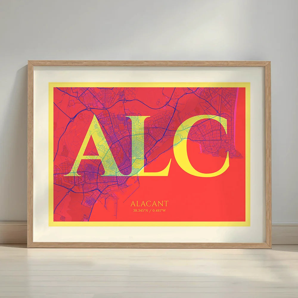 Framed Alacant in Classic design, inspired by chiseled typography with an elegant font that creates a beautiful visual contrast designed in yellow and fuchsia with a white margin border in a warm lit minimalist setting
