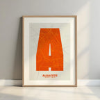 Framed Albacete in Super Bold design, a typographic poster where the city map is overlaid with extra-thick lettering for a modern, high-impact look designed in orange and an off-white background with a white margin border in a warm lit minimalist setting