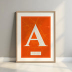 Framed Albacete in Classic design, inspired by chiseled typography with an elegant font that creates a beautiful visual contrast designed in orange and an off-white background with a white margin border in a warm lit minimalist setting
