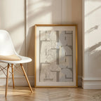 Modern interior design with a Algeciras in Inseparable design, featuring the city's abbreviation in expressive typography over a detailed urban map designed in light brown and an off-white background, displayed on a living room wall