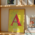 Modern interior design with a Algeciras in Classic design, inspired by chiseled typography with an elegant font that creates a beautiful visual contrast designed in yellow and fuchsia, displayed on a living room wall
