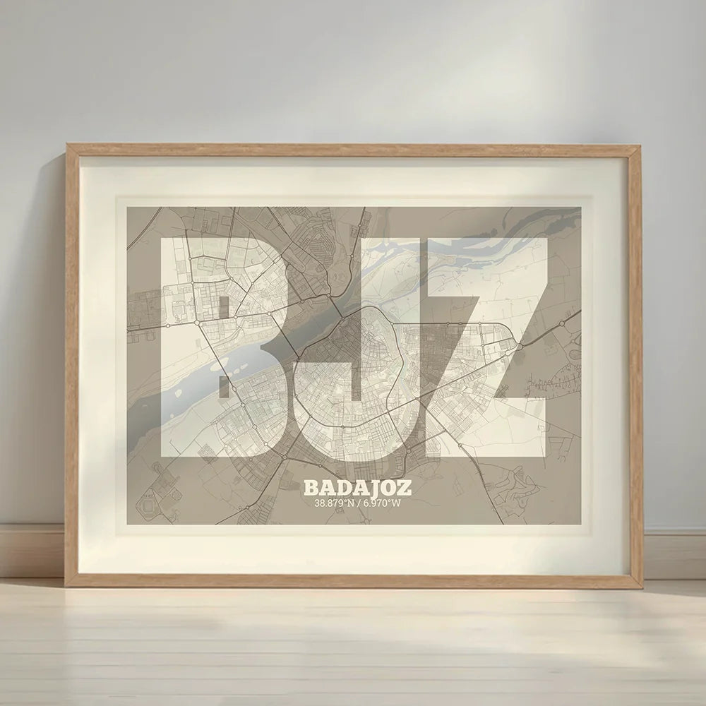 Framed Badajoz in Super Bold design, a typographic poster where the city map is overlaid with extra-thick lettering for a modern, high-impact look designed in light brown and an off-white background with a white margin border in a warm lit minimalist setting