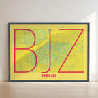 Framed Badajoz in Ultralight design, a minimalist aesthetic combining urban cartography with modern, extra-thin elegant lettering designed in yellow and fuchsia with no border edge-to-edge print leaning against a wall