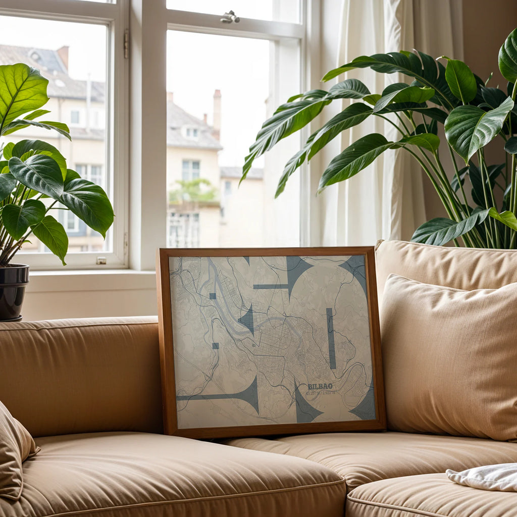Modern interior design with a Bilbao in Inseparable design, featuring the city's abbreviation in expressive typography over a detailed urban map designed in bluish gray and an off-white background, displayed on a living room wall