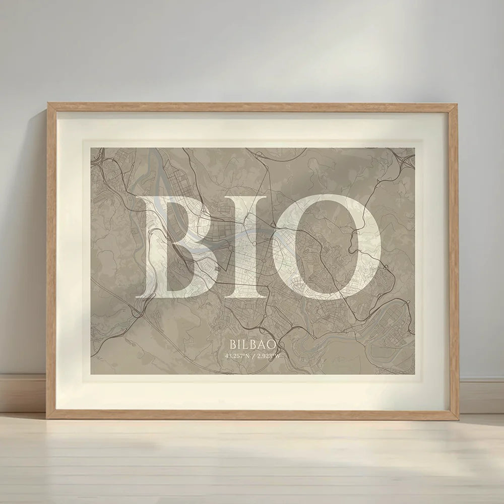 Framed Bilbao in Classic design, inspired by chiseled typography with an elegant font that creates a beautiful visual contrast designed in light brown and an off-white background with a white margin border in a warm lit minimalist setting