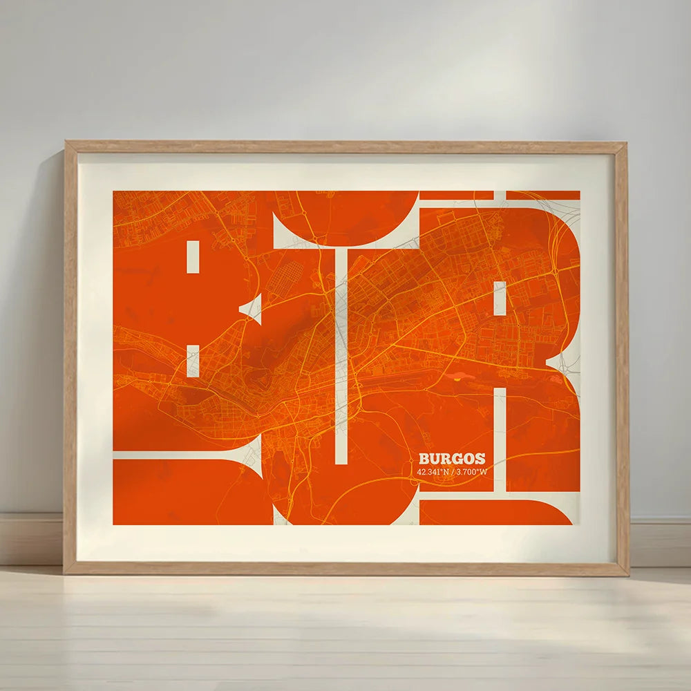 Framed Burgos in Inseparable design, featuring the city's abbreviation in expressive typography over a detailed urban map designed in orange and an off-white background with a white margin border in a warm lit minimalist setting