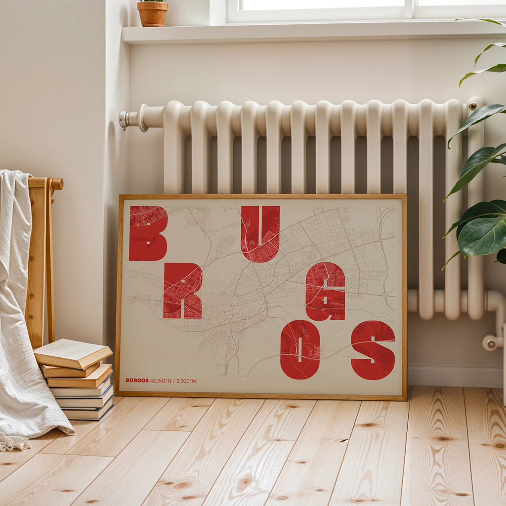 Diseño de interiores moderno con la lámina de Burgos en el diseño la Revoltosa, donde las letras del nombre aparecen aleatoriamente en diferentes líneas para un diseño urbano realmente original diseñado en rojo y fondo blanco roto, expuesto en la pared de un salón