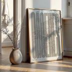 Modern interior design with a Caceres in Extra Compressed design, where the letters are tightly squeezed to fit the city's map shape designed in light brown and an off-white background, displayed on a living room wall
