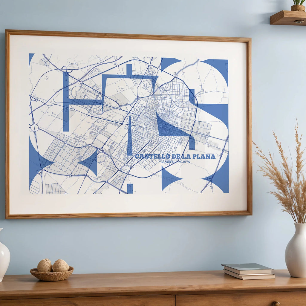 Modern interior design with a Castellon in Inseparable design, featuring the city's abbreviation in expressive typography over a detailed urban map designed in navy blue and white, displayed on a living room wall