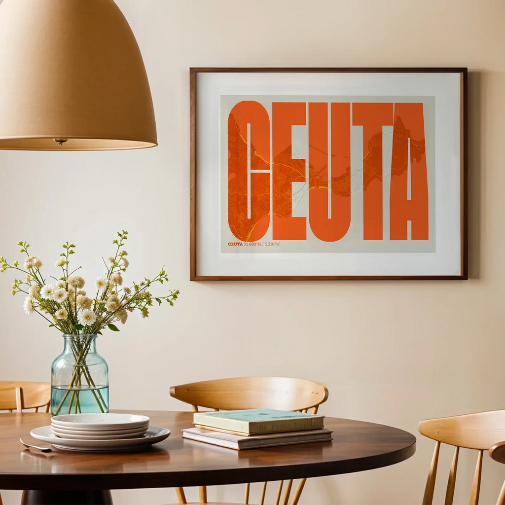 Modern interior design with a Ceuta in Extra Compressed design, where the letters are tightly squeezed to fit the city's map shape designed in orange and an off-white background, displayed on a living room wall
