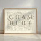 Framed Chamberi in Classic design, inspired by chiseled typography with an elegant font that creates a beautiful visual contrast designed in light brown and an off-white background with a white margin border in a warm lit minimalist setting