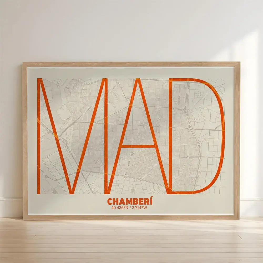 Framed Chamberi in Ultralight design, a minimalist aesthetic combining urban cartography with modern, extra-thin elegant lettering designed in orange and an off-white background with no border edge-to-edge print leaning against a wall