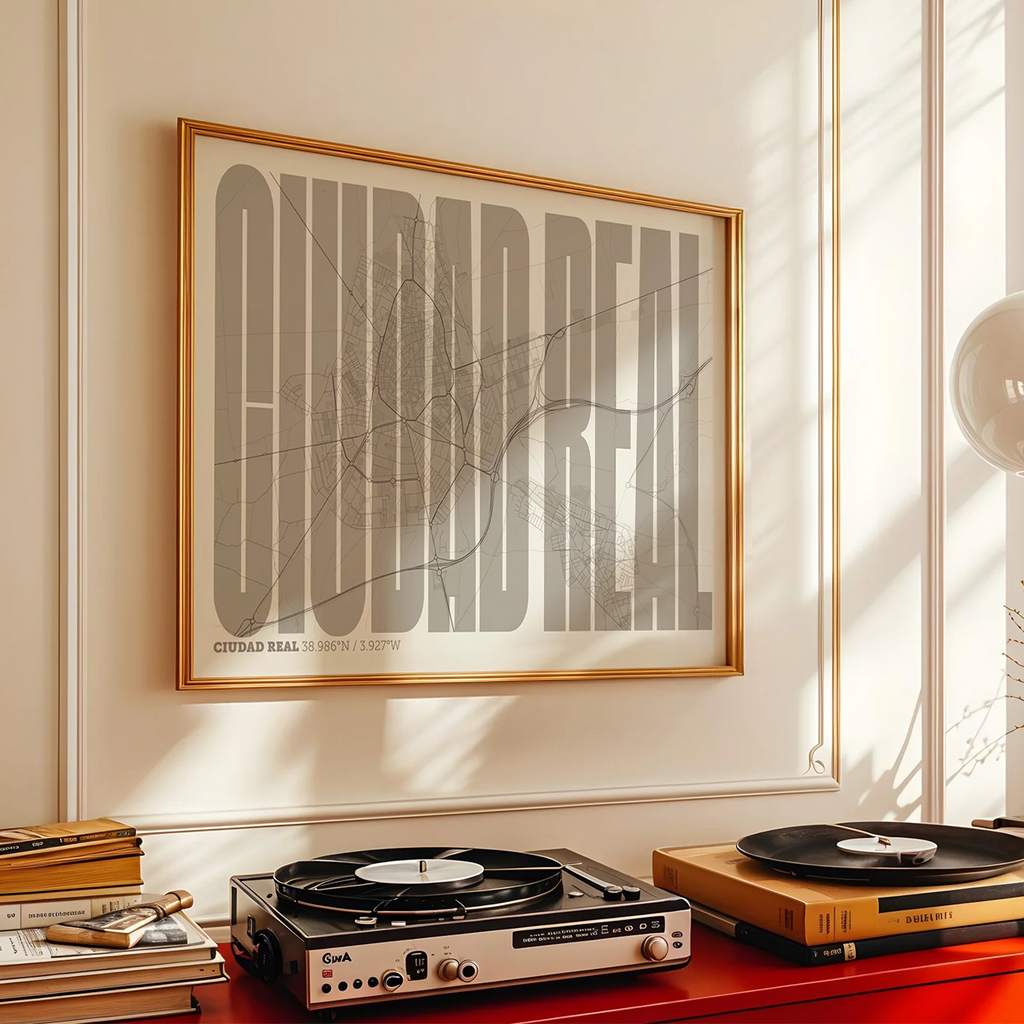 Modern interior design with a Ciudad Real in Extra Compressed design, where the letters are tightly squeezed to fit the city's map shape designed in light brown and an off-white background, displayed on a living room wall