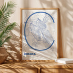 Modern interior design with a Cuenca in Ultralight design, a minimalist aesthetic combining urban cartography with modern, extra-thin elegant lettering designed in navy blue and white, displayed on a living room wall