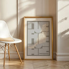 Modern interior design with a Fuerteventura in Inseparable design, featuring the city's abbreviation in expressive typography over a detailed urban map designed in light brown and an off-white background, displayed on a living room wall
