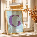 Modern interior design with a Gracia Quarter in Classic design, inspired by chiseled typography with an elegant font that creates a beautiful visual contrast designed in orange and an off-white background, displayed on a living room wall