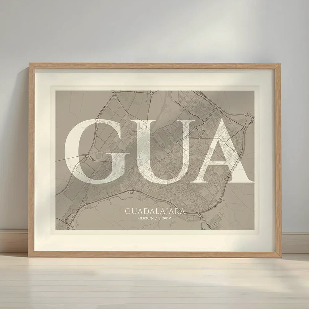 Framed Guadalajara in Classic design, inspired by chiseled typography with an elegant font that creates a beautiful visual contrast designed in light brown and an off-white background with a white margin border in a warm lit minimalist setting