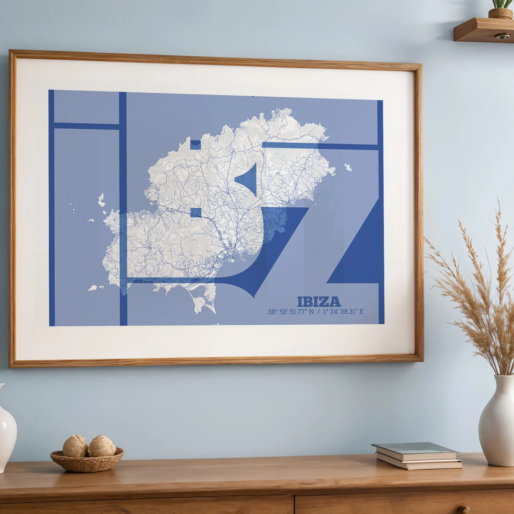 Modern interior design with a Ibiza in Inseparable design, featuring the city's abbreviation in expressive typography over a detailed urban map designed in navy blue and white, displayed on a living room wall