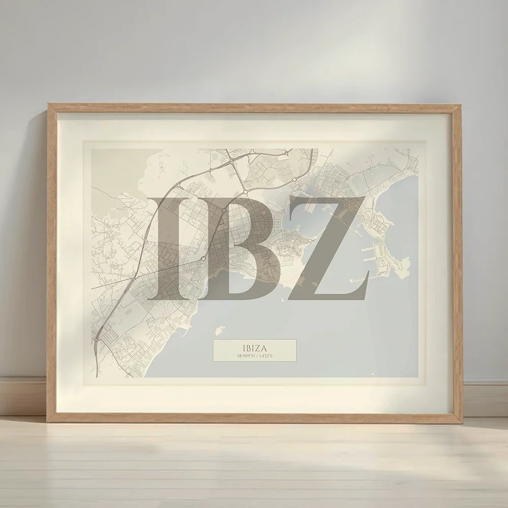 Framed Ibiza in Classic design, inspired by chiseled typography with an elegant font that creates a beautiful visual contrast designed in light brown and an off-white background with a white margin border in a warm lit minimalist setting