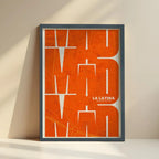 Framed La Latina, Madrid, in Inseparable design, featuring the city's abbreviation in expressive typography over a detailed urban map designed in orange and an off-white background with no border edge-to-edge print leaning against a wall