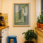 Modern interior design with a Las Palmas in Super Bold design, a typographic poster where the city map is overlaid with extra-thick lettering for a modern, high-impact look designed in two green tones, displayed on a living room wall