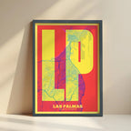 Framed Las Palmas in Super Bold design, a typographic poster where the city map is overlaid with extra-thick lettering for a modern, high-impact look designed in yellow and fuchsia with no border edge-to-edge print leaning against a wall