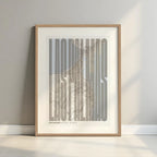 Framed Las Palmas in Extra Compressed design, where the letters are tightly squeezed to fit the city's map shape designed in light brown and an off-white background with a white margin border in a warm lit minimalist setting