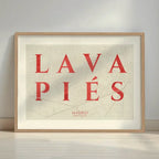 Framed Lavapies, Madrid, in Classic design, inspired by chiseled typography with an elegant font that creates a beautiful visual contrast designed in red and an off-white background with a white margin border in a warm lit minimalist setting