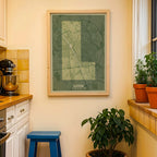Modern interior design with a Leon in Super Bold design, a typographic poster where the city map is overlaid with extra-thick lettering for a modern, high-impact look designed in two green tones, displayed on a living room wall