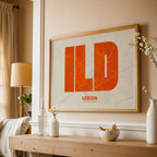 Modern interior design with a Lerida in Super Bold design, a typographic poster where the city map is overlaid with extra-thick lettering for a modern, high-impact look designed in orange and an off-white background, displayed on a living room wall
