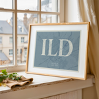 Modern interior design with a Lerida in Classic design, inspired by chiseled typography with an elegant font that creates a beautiful visual contrast designed in bluish gray and an off-white background, displayed on a living room wall