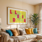 Modern interior design with a Lleida in Unruled design, where the city name letters appear randomly across different lines for a truly original urban layout designed in yellow and fuchsia, displayed on a living room wall