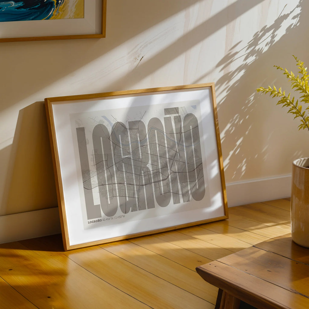 Modern interior design with a Logroño in Extra Compressed design, where the letters are tightly squeezed to fit the city's map shape designed in light brown and an off-white background, displayed on a living room wall