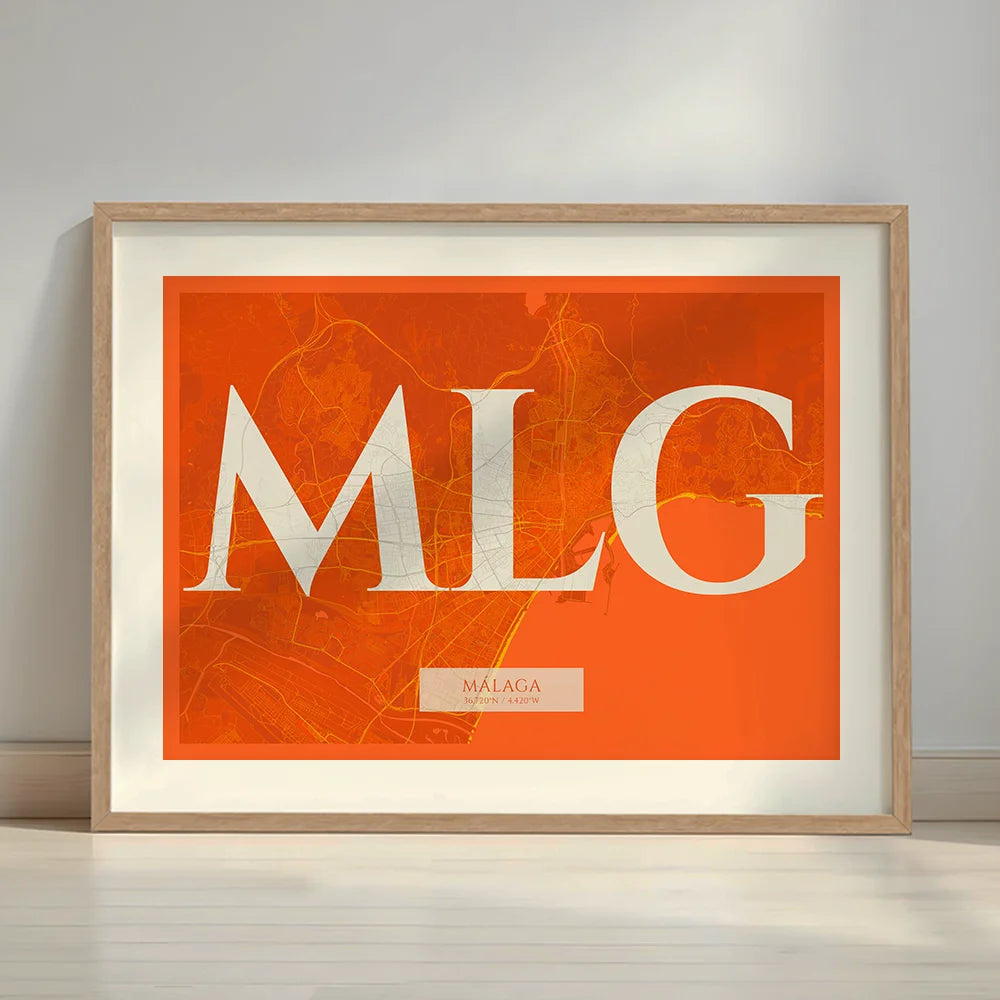 Framed Malaga in Classic design, inspired by chiseled typography with an elegant font that creates a beautiful visual contrast designed in orange and an off-white background with a white margin border in a warm lit minimalist setting