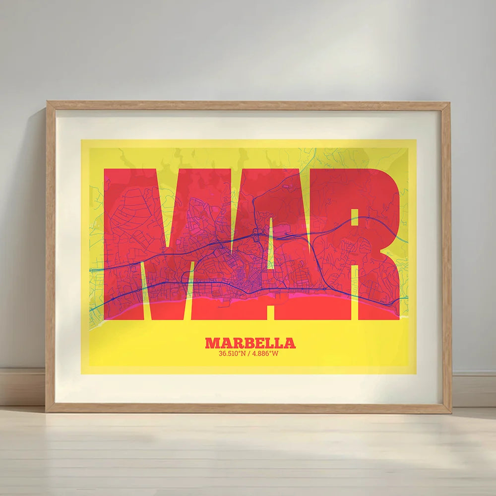 Framed Marbella in Super Bold design, a typographic poster where the city map is overlaid with extra-thick lettering for a modern, high-impact look designed in yellow and fuchsia with a white margin border in a warm lit minimalist setting