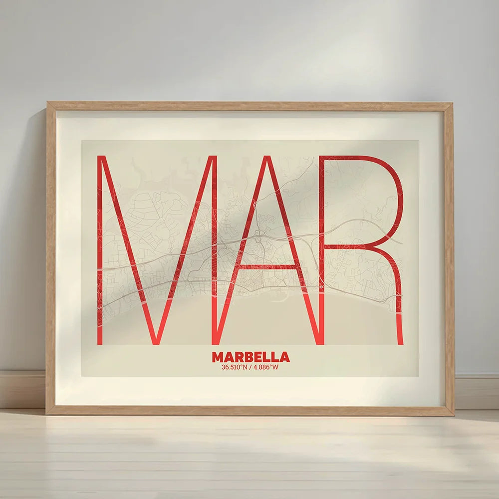 Framed Marbella in Ultralight design, a minimalist aesthetic combining urban cartography with modern, extra-thin elegant lettering designed in red and an off-white background with a white margin border in a warm lit minimalist setting