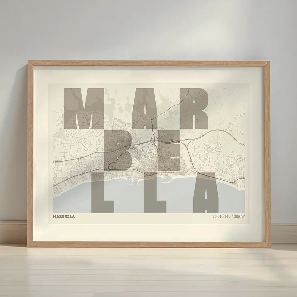 Framed Marbella in Unruled design, where the city name letters appear randomly across different lines for a truly original urban layout designed in light brown and an off-white background with a white margin border in a warm lit minimalist setting