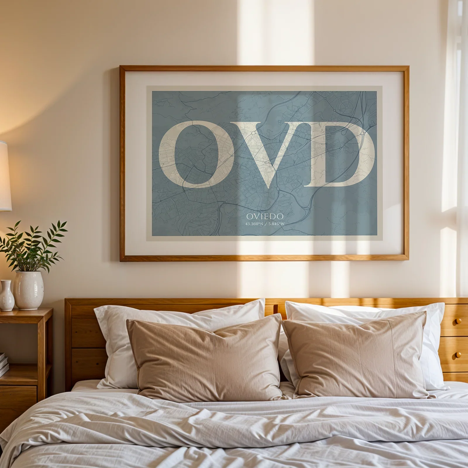 Modern interior design with a Oviedo in Classic design, inspired by chiseled typography with an elegant font that creates a beautiful visual contrast designed in bluish gray and an off-white background, displayed on a living room wall