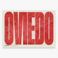 Decorative map of Oviedo and letters of its name in a giclée print designed in red and an off-white background