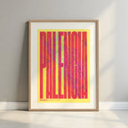 Framed Palencia in Extra Compressed design, where the letters are tightly squeezed to fit the city's map shape designed in yellow and fuchsia with a white margin border in a warm lit minimalist setting