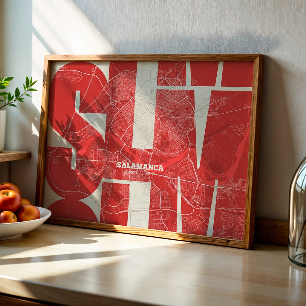 Modern interior design with a Salamanca in Inseparable design, featuring the city's abbreviation in expressive typography over a detailed urban map designed in red and an off-white background, displayed on a living room wall