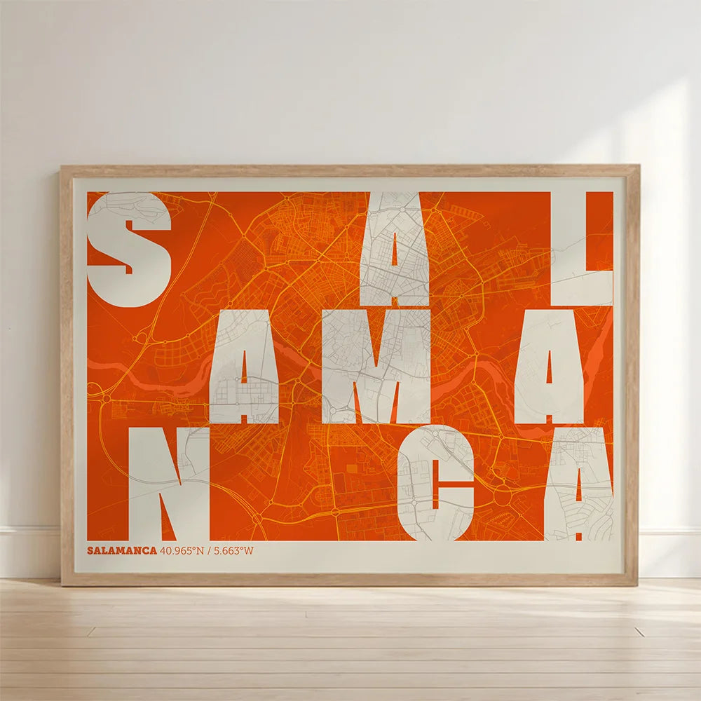 Framed Salamanca in Unruled design, where the city name letters appear randomly across different lines for a truly original urban layout designed in orange and an off-white background with no border edge-to-edge print leaning against a wall