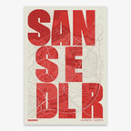 Mapa de San Sebastián de los Reyes en el diseño la Revoltosa, donde las letras del nombre aparecen aleatoriamente en diferentes líneas para un diseño urbano realmente original diseñado en rojo y fondo blanco roto