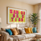 Modern interior design with a San Sebastian in Unruled design, where the city name letters appear randomly across different lines for a truly original urban layout designed in yellow and fuchsia, displayed on a living room wall