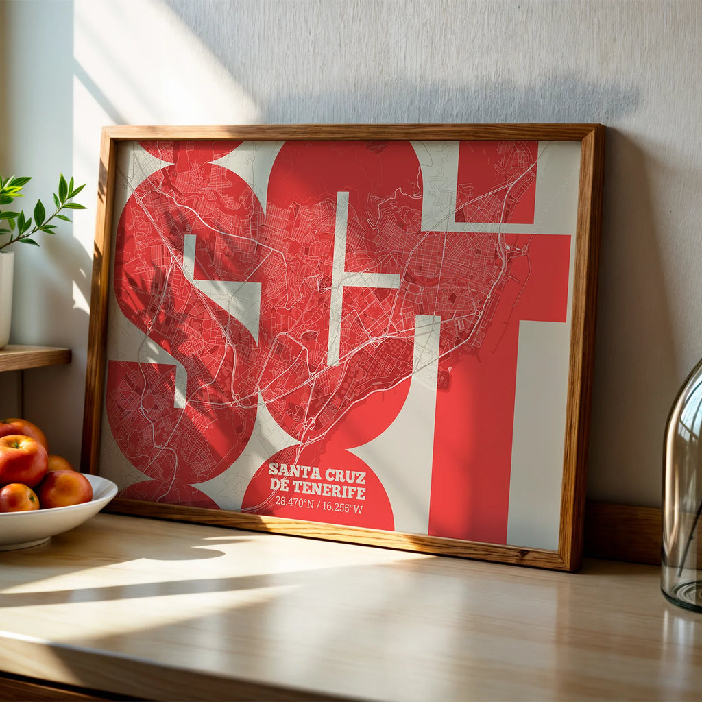 Modern interior design with a Santa Cruz de Tenerife in Inseparable design, featuring the city's abbreviation in expressive typography over a detailed urban map designed in red and an off-white background, displayed on a living room wall
