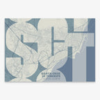 Mapa de Santa Cruz de Tenerife en mi diseño la Inseparable, una visión artística con una tipografía expresiva que muestra la abreviatura del nombre sobre el mapa detallado diseñado en gris azulado y fondo blanco roto