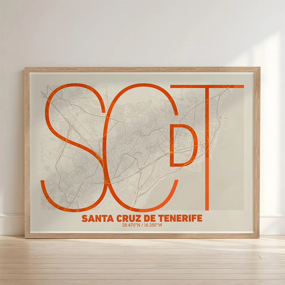 Framed Santa Cruz de Tenerife in Ultralight design, a minimalist aesthetic combining urban cartography with modern, extra-thin elegant lettering designed in orange and an off-white background with no border edge-to-edge print leaning against a wall