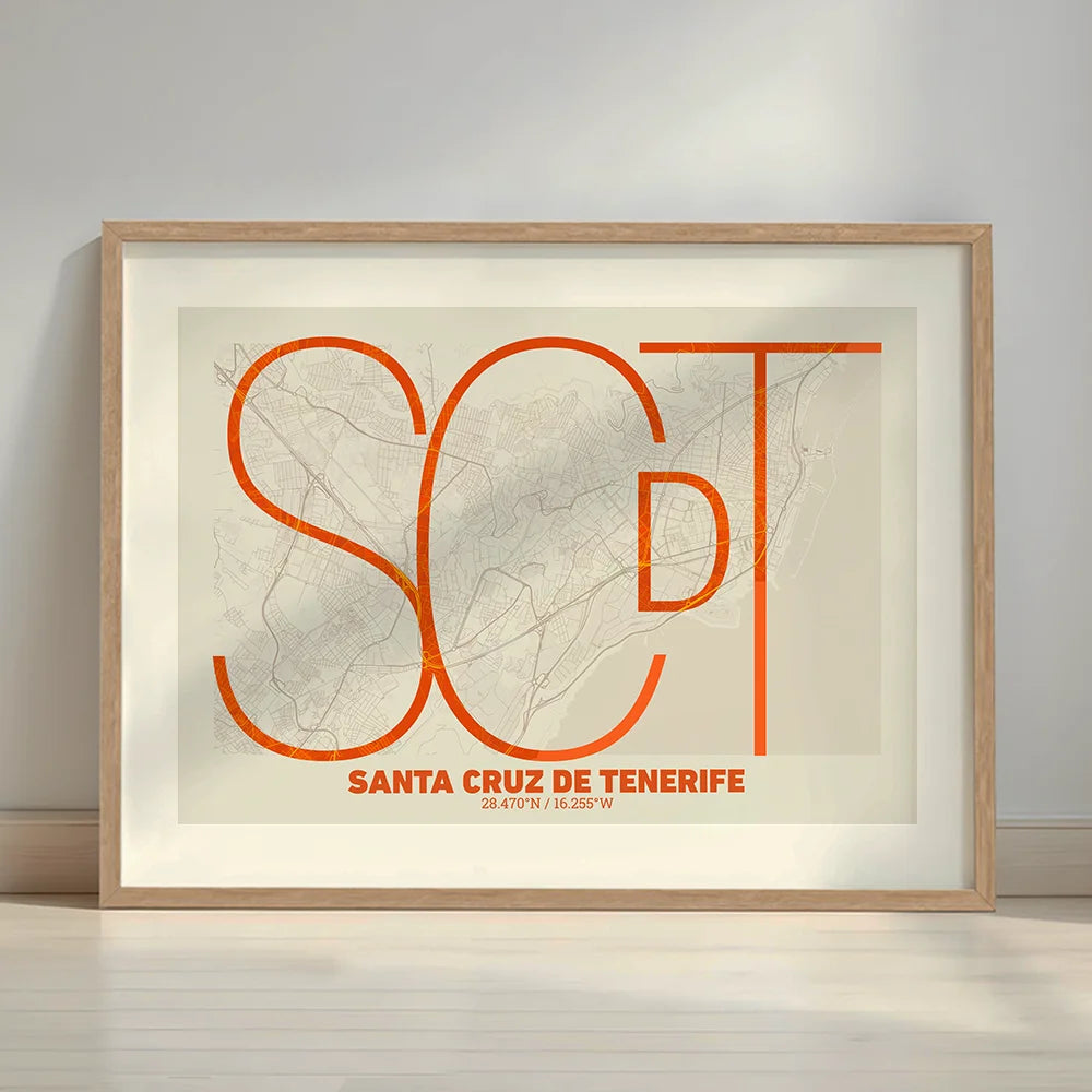 Framed Santa Cruz de Tenerife in Ultralight design, a minimalist aesthetic combining urban cartography with modern, extra-thin elegant lettering designed in orange and an off-white background with a white margin border in a warm lit minimalist setting