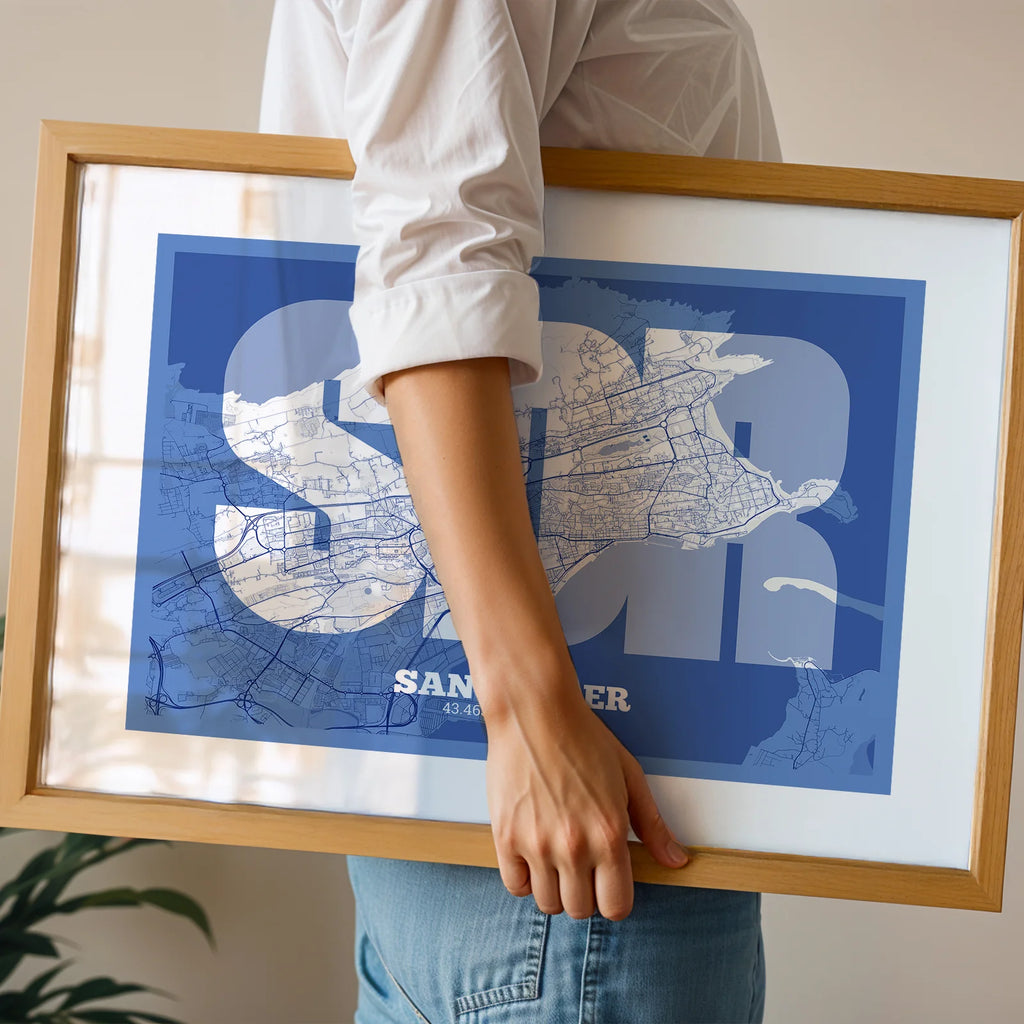 Modern interior design with a Santander in Super Bold design, a typographic poster where the city map is overlaid with extra-thick lettering for a modern, high-impact look designed in navy blue and white, displayed on a living room wall